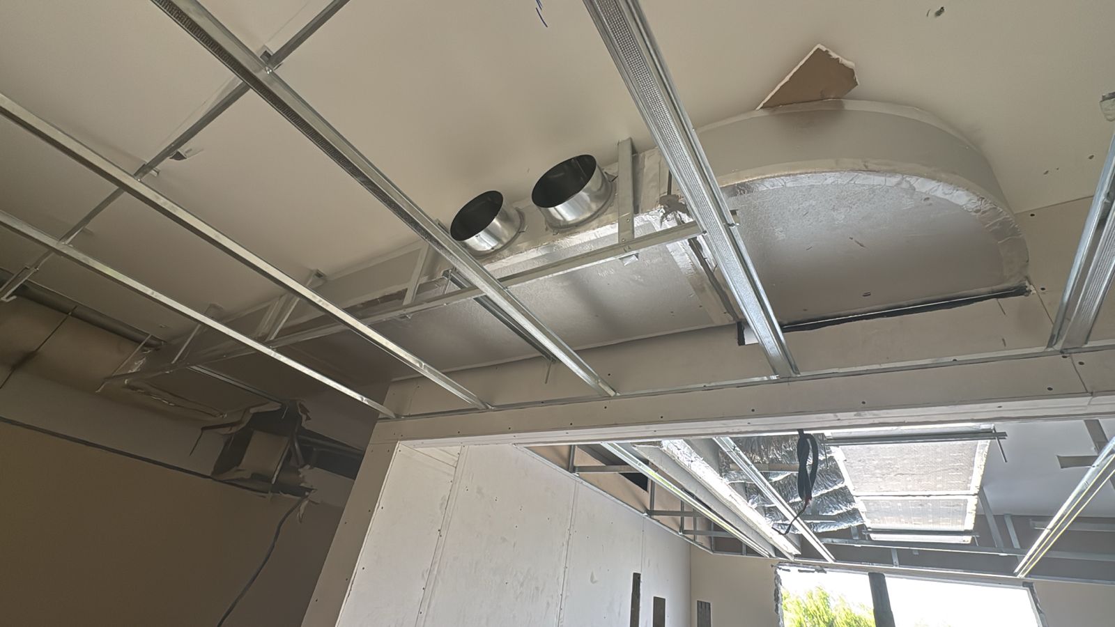 HVAC duct detail with ceiling grid framing