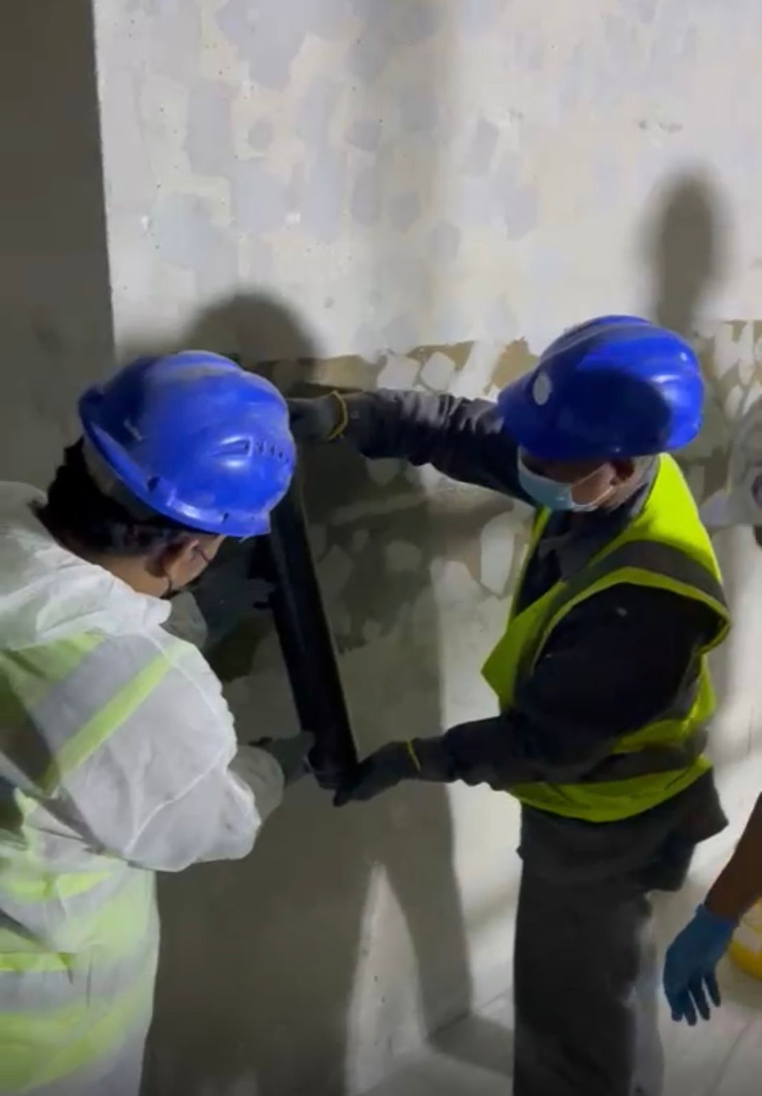 CFRP wall strengthening by specialist technicians