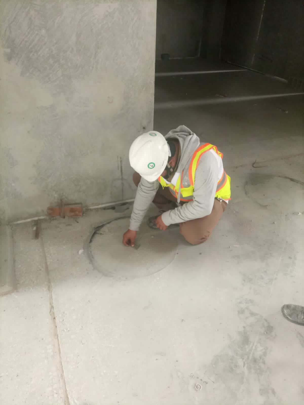 Concrete floor smoothing and patching work