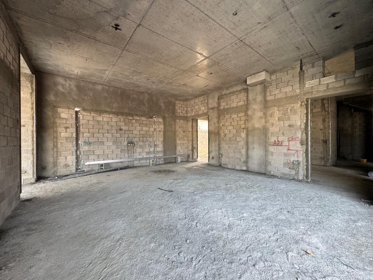 Villa room with blockwork walls and MEP rough-in