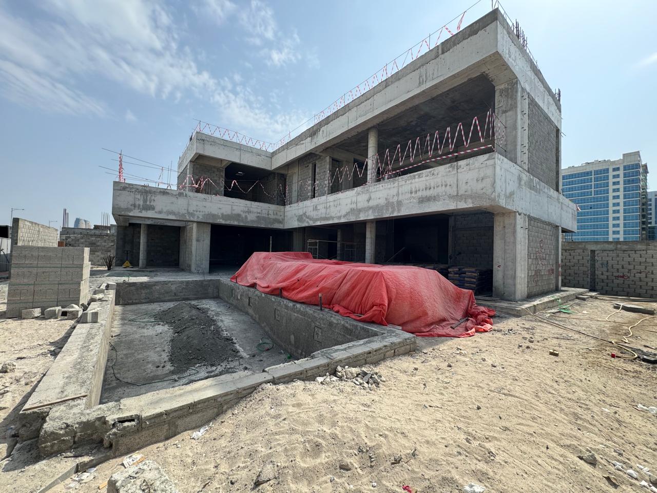 Villa concrete shell structure with pool area