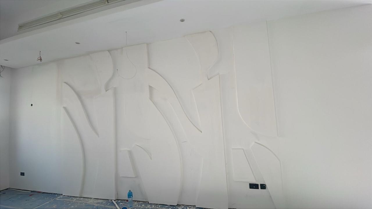 Abstract gypsum wall sculpture in villa room