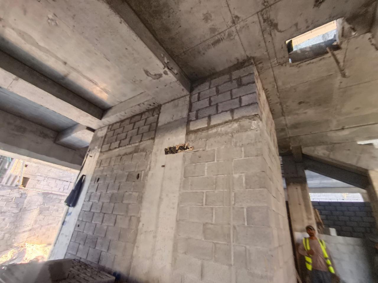 Interior blockwork partition walls under concrete slab