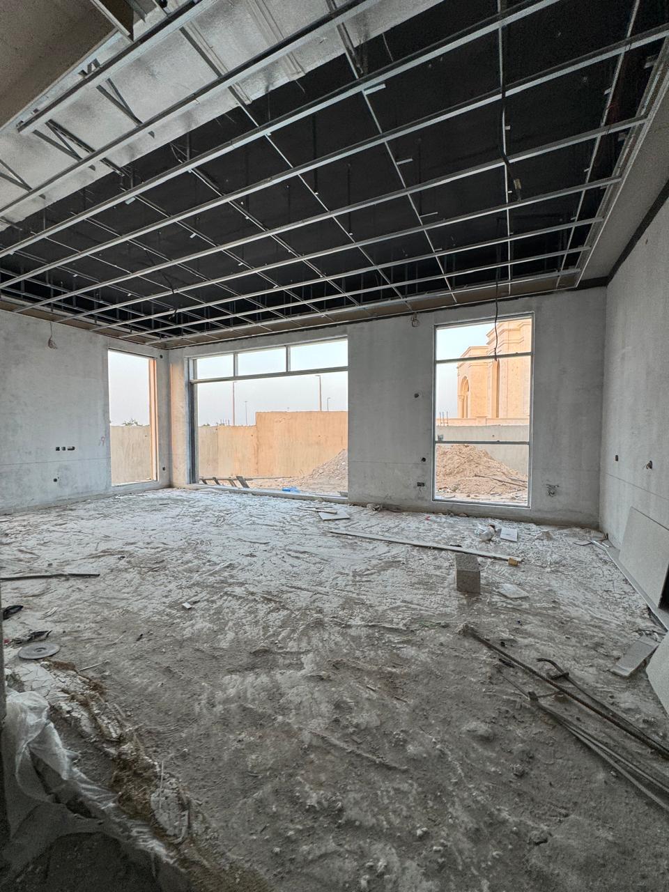 Ceiling grid framing in villa room before boarding
