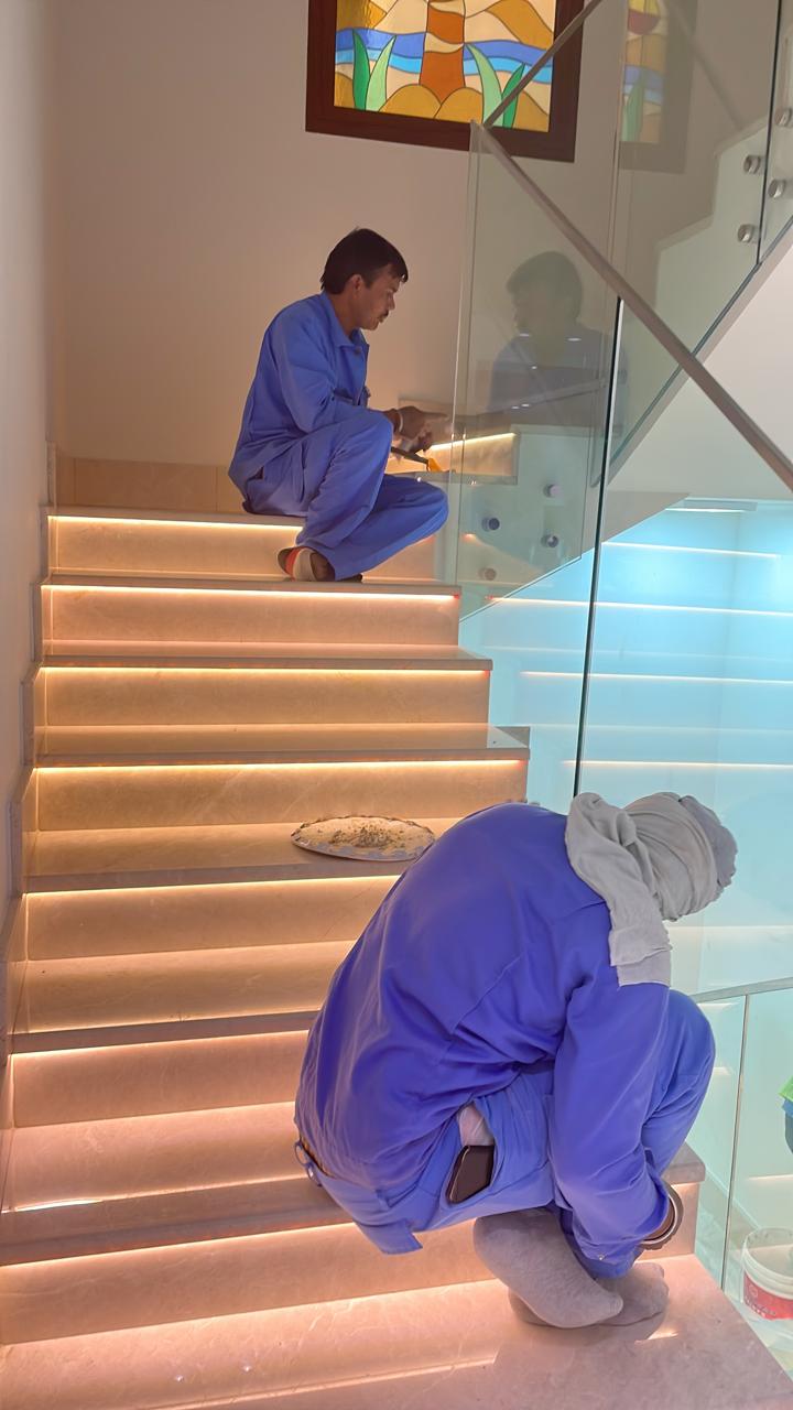Glass staircase with LED lighting – finishing works Abu Dhabi