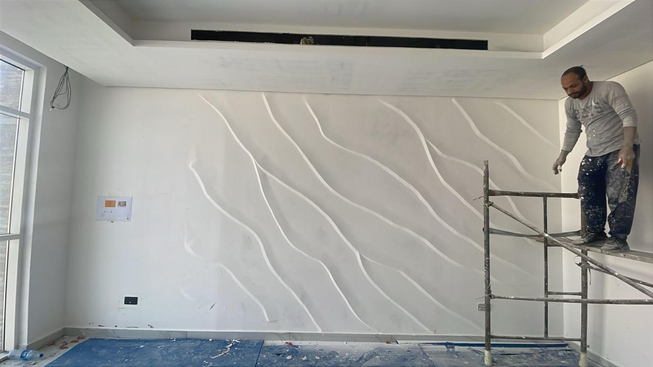 Decorative wave pattern wall sculpture finishing