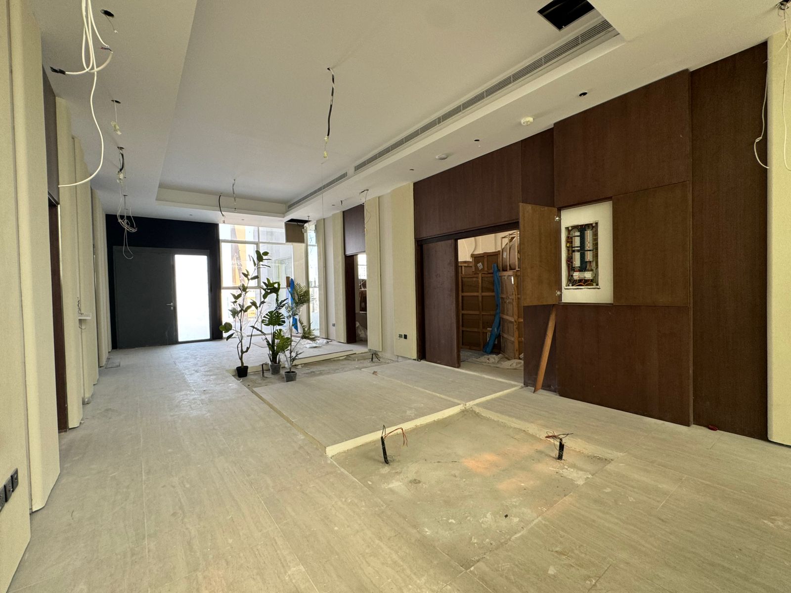 Villa entrance lobby wide angle with wood panel wall