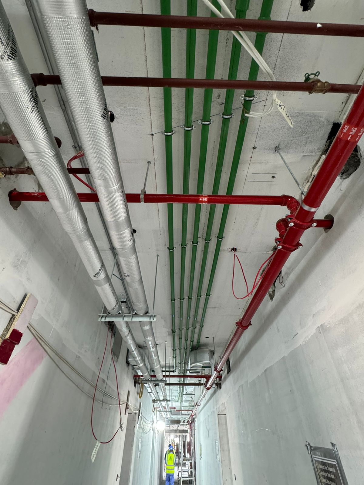 MEP pipe installation corridor – plumbing and fire fighting services Abu Dhabi