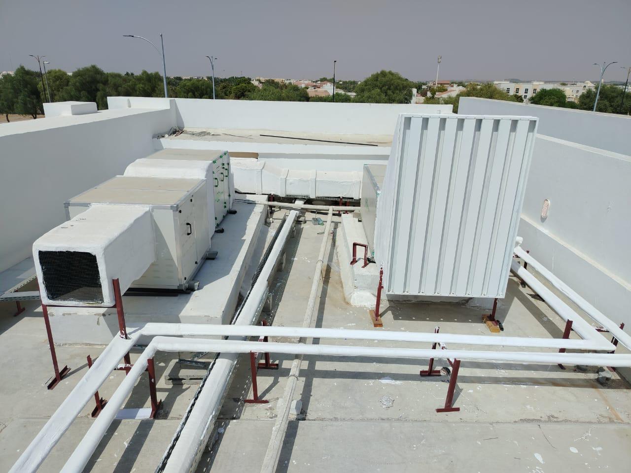 Rooftop AC condensing units and chilled water piping