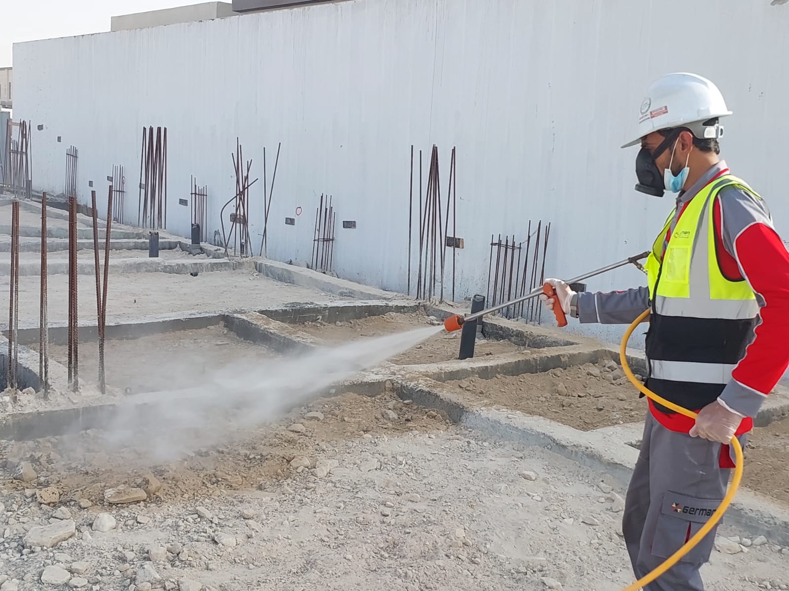 Anti-termite treatment spray on foundation