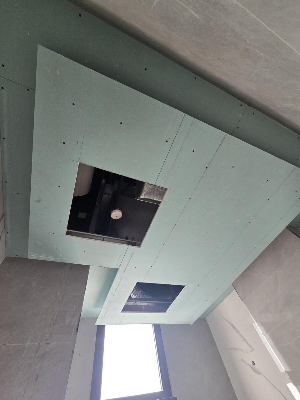 Bathroom gypsum ceiling with AC and vent cutouts