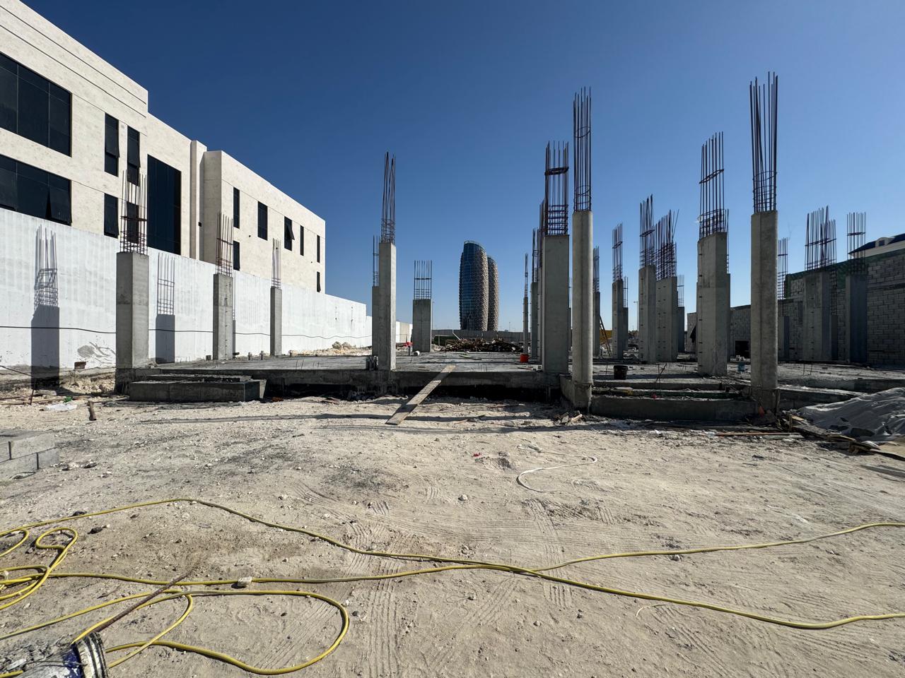 Civil construction site with reinforced concrete columns in Abu Dhabi