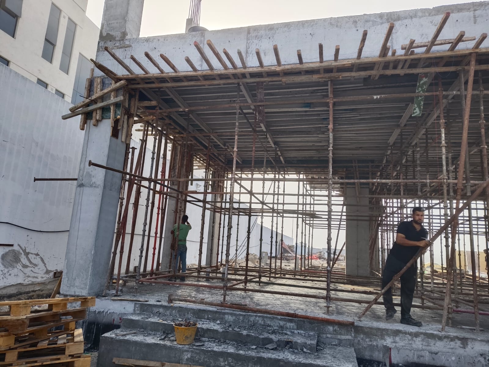 Concrete pump pouring slab
