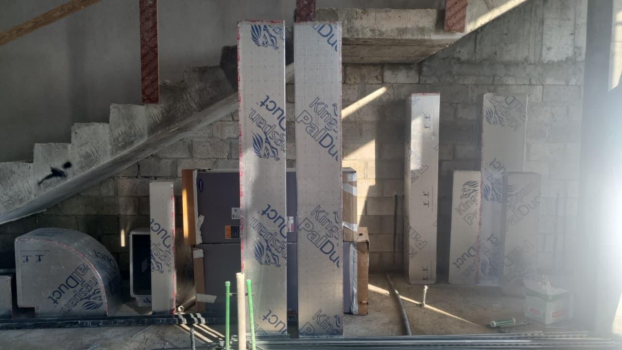 Insulated duct panels stored on site before installation