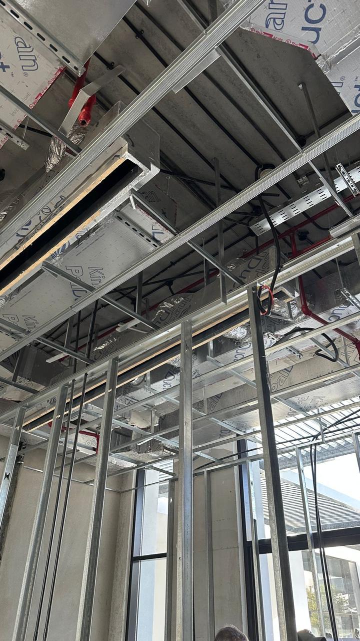 Ceiling MEP and metal stud framing in commercial fit-out